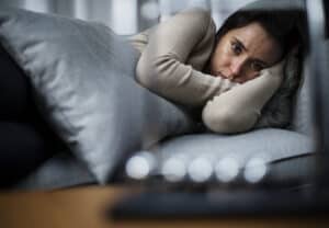 Depressed Woman In Bed