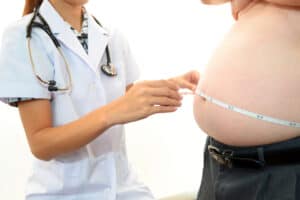 Obese Patient With Doctor